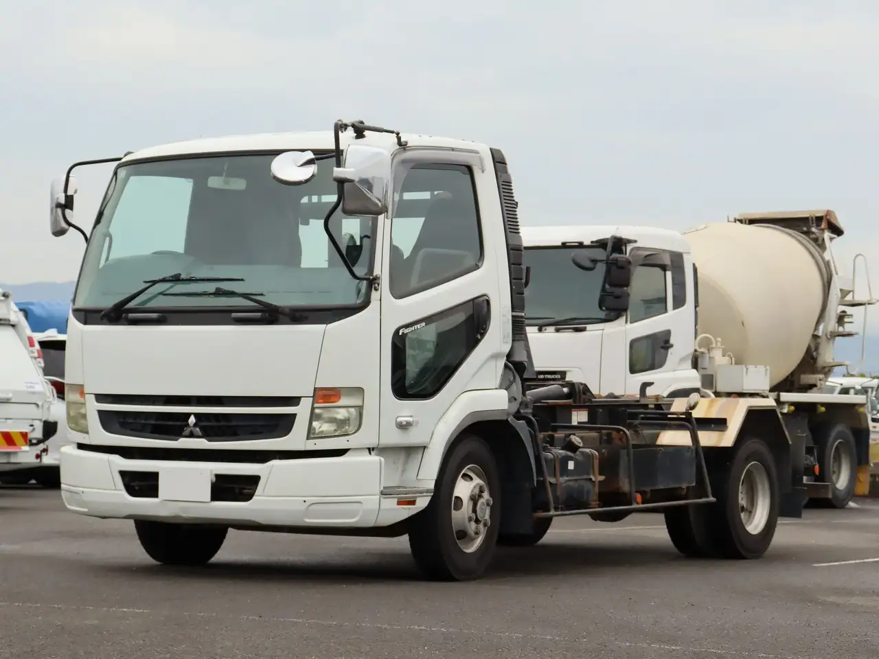 三菱 ファイター 中型/増トン アームロール ツインホイスト PDG-FK71F の中古トラック【車両No.201035】